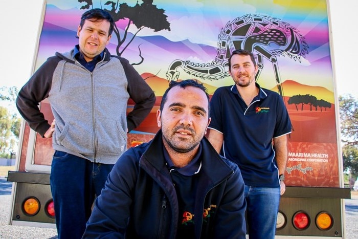 Maari Ma team stand outside their health van in Wilcannia.