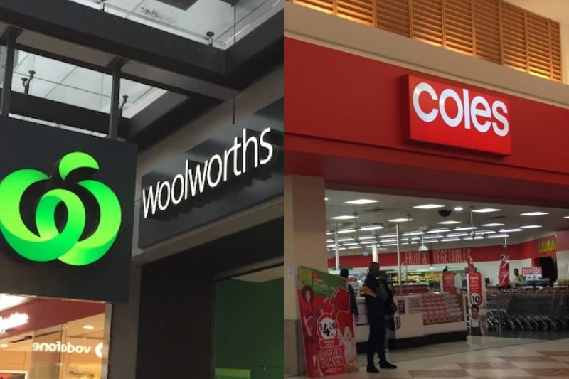 A Woolworths sign next to a Coles sign outside the shops