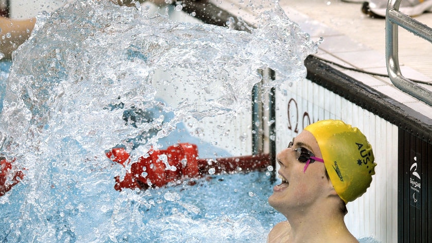 Matthew Cowdrey celebrates after winning the men's 100m backstroke S9 final.
