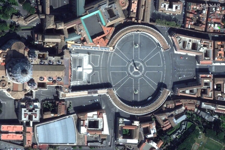 A satellite image shows St Peter's Square in Rome empty during Palm Sunday
