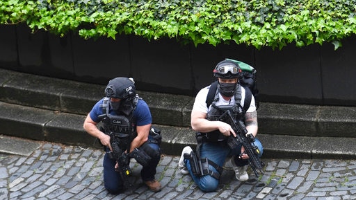 Armed police respond to the terrorist attack outside the Houses of Parliament in London on March 22, 2017.