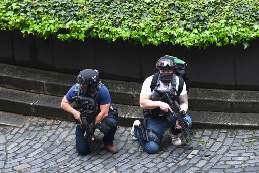 Armed police respond to the terrorist attack outside the Houses of Parliament in London on March 22, 2017.