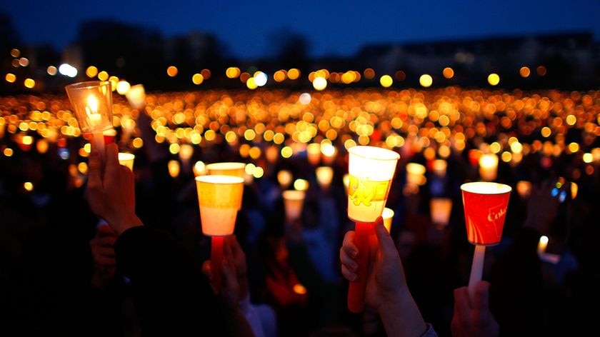 Mourning: Students are taking part in a night-long vigil at Virginia Tech.