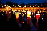 Mourning: Students are taking part in a night-long vigil at Virginia Tech.
