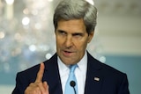 John Kerry will meet with Afghanistan's presidential candidates after arriving in the country today.