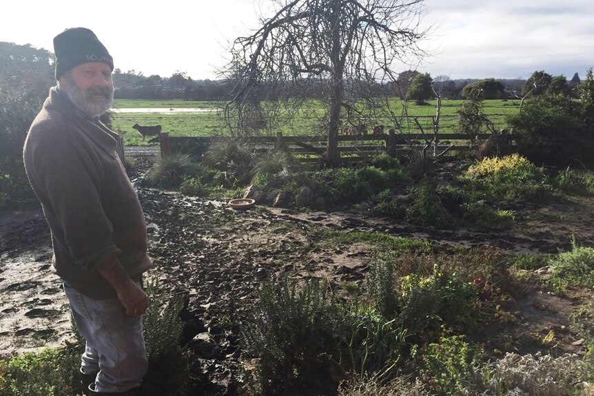 Geoff Heazlewood stands where the flood waters ranged on Monday morning