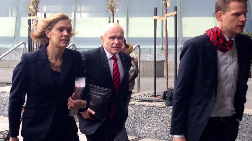 Essendon FC Chairman Paul Little arrives at Federal Court in Melbourne with the Essendon legal team.