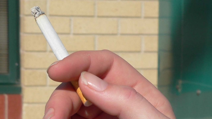 smoker holding a cigarette