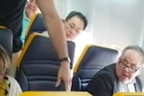 Man hurls racial abuse at elderly black woman on flight, refuses to sit next to her