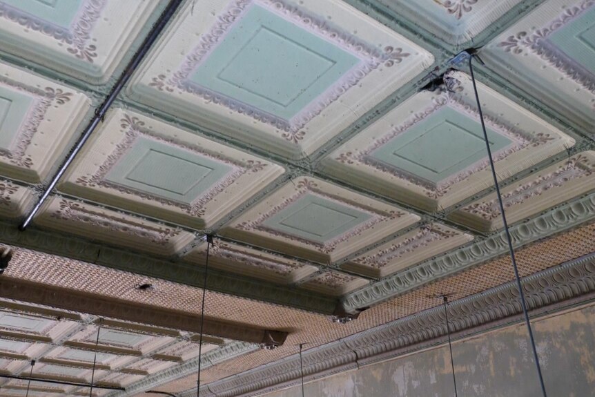 an ornate pressed-metal ceiling