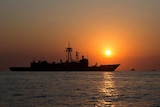 Royal Australian Navy ship, HMAS Newcastle, at sunrise during Exercise Kakadu 2018.