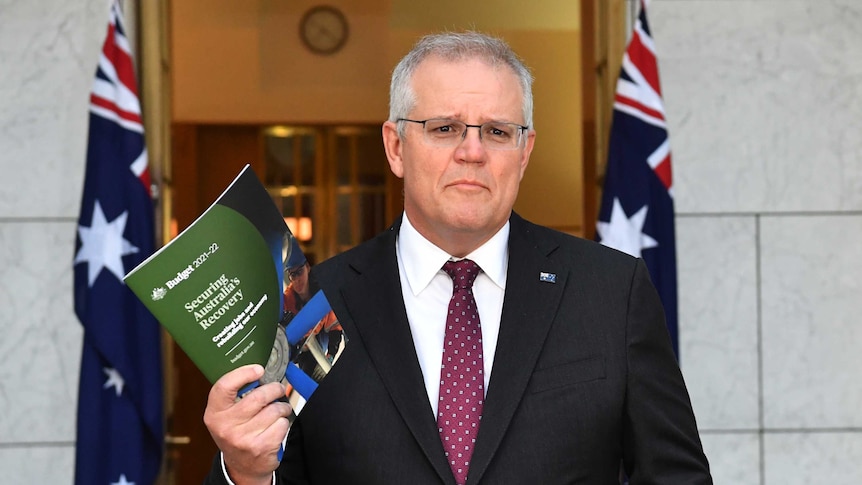 Prime Minister Scott Morrison addresses a morning television interview in the Prime Minister's Courtyard at Parliament House