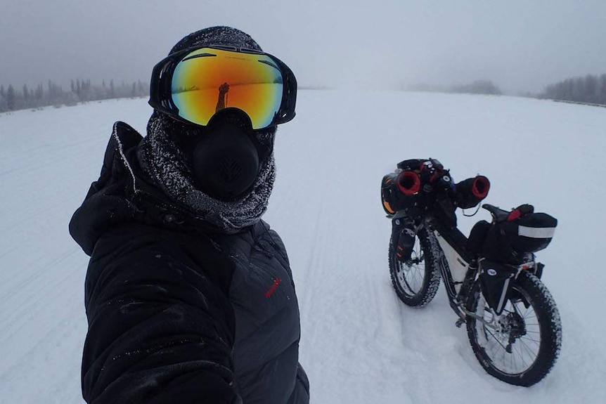 Brisbane bicycle mechanic Troy Szczurkowski (left) with his fat bike in Alaska