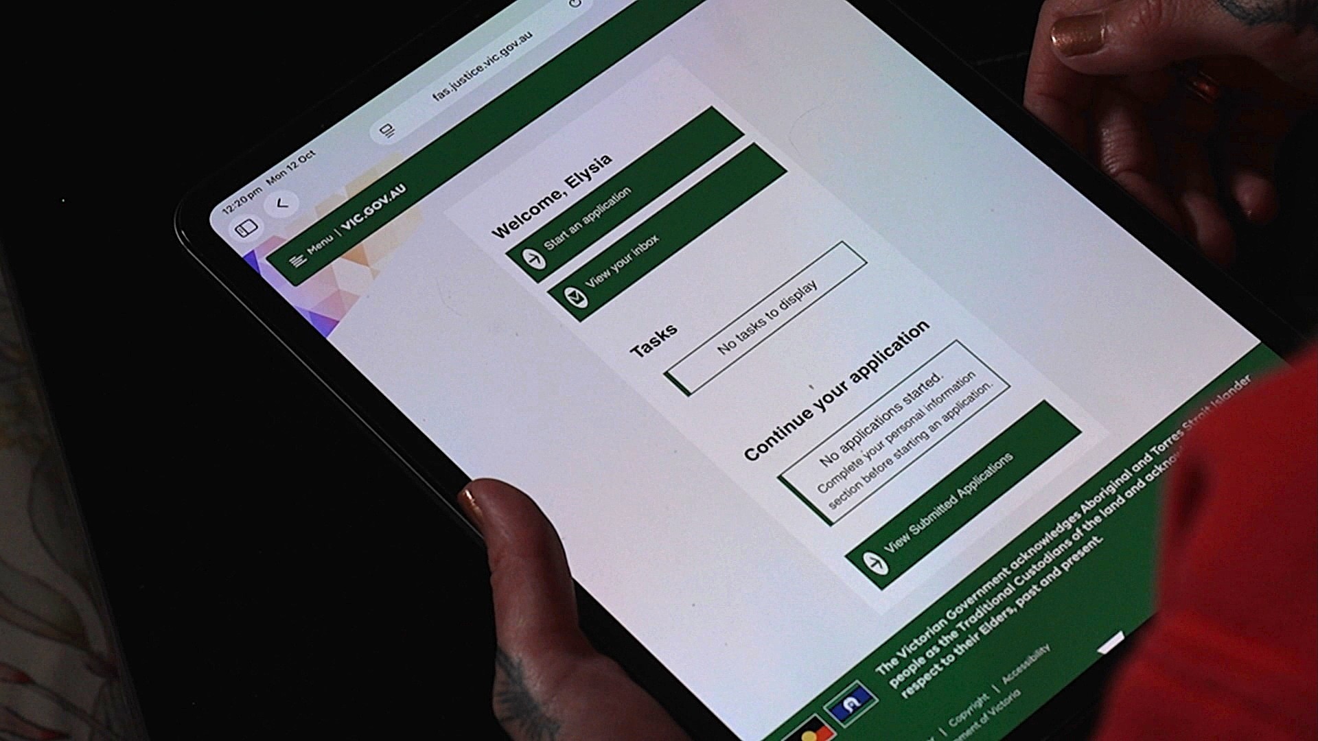 A woman looking at an iPad