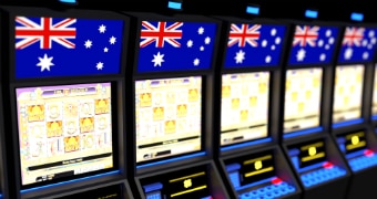 A row of poker machines with Australian flags superimposed on top.