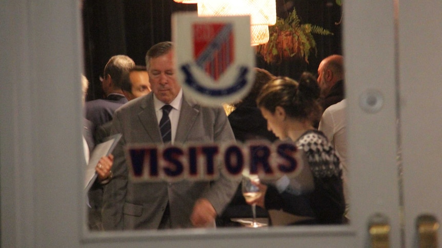 Former Wentworth MP Peter King inside the building as Liberal pre-selection voters mingle