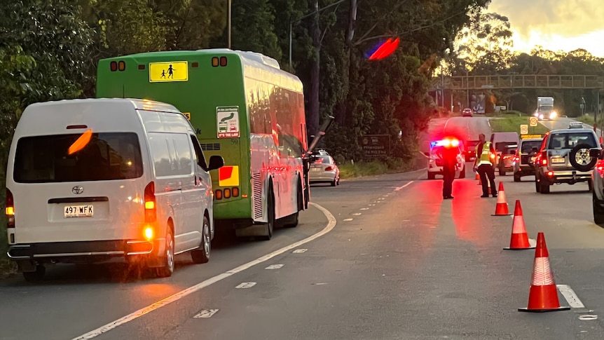Two mechanics hit and killed by a car while working on a broken down bus in Woombye on the Sunshine Coast