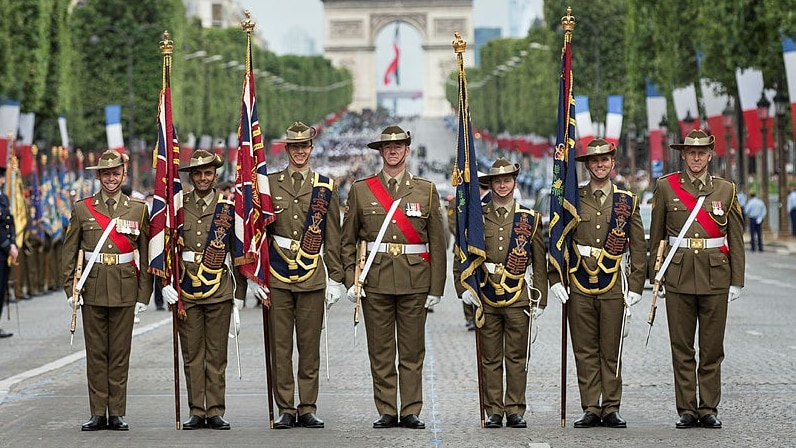 Australia's Federation Guard leads a march down the Champs Elysees