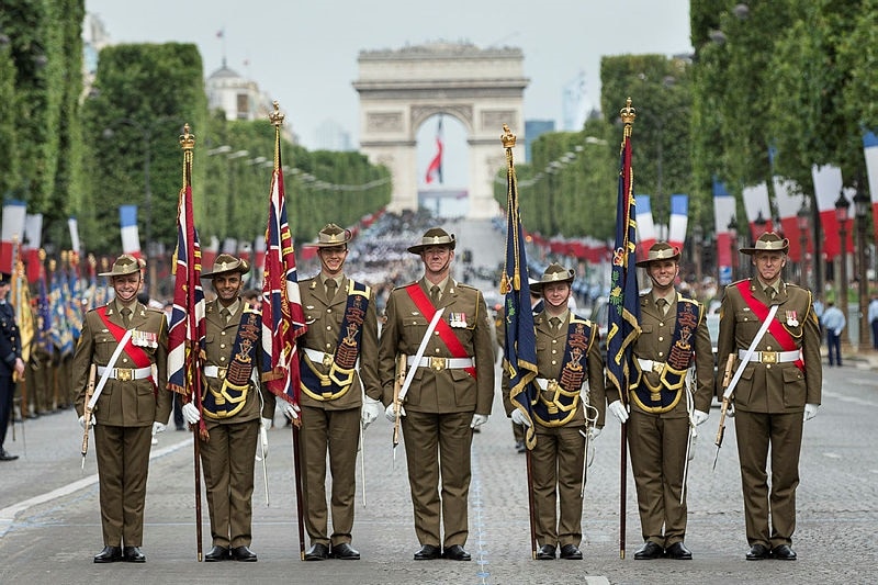 Australia's Federation Guard leads a march down the Champs Elysesse