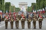 Australia's Federation Guard leads a march down the Champs Elysees