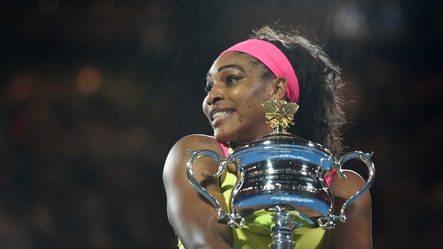 Close friends ... Serena Williams shows off the Daphne Akhurst Memorial Cup