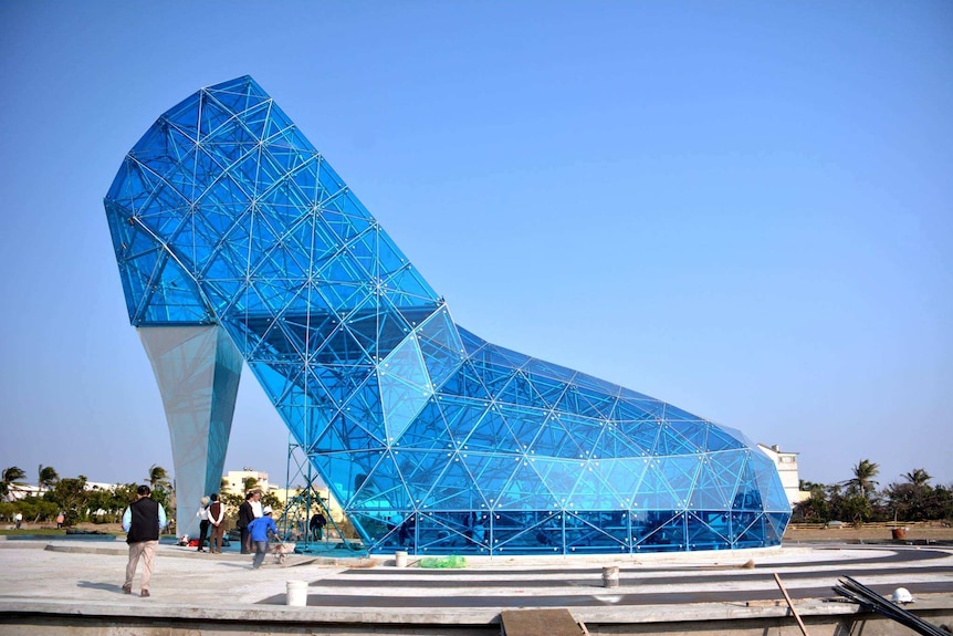 Blue shoe-shaped church building