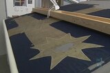 Eureka flag has been painstakingly restored to glory by Adelaide conservators