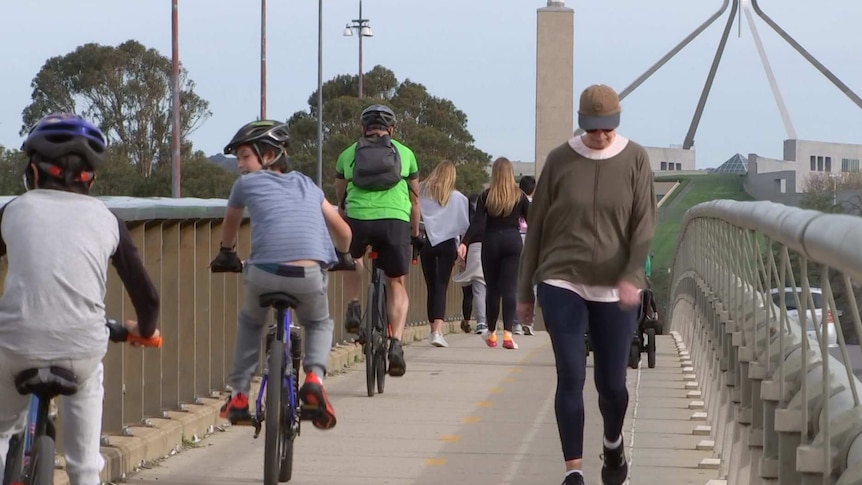 People walking at Lake Burley Griffin.