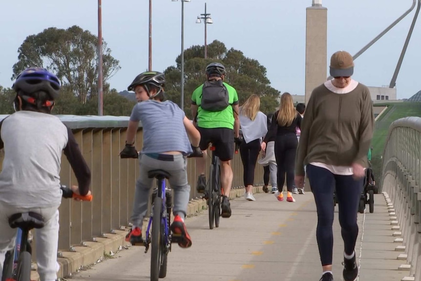 People walking at Lake Burley Griffin.