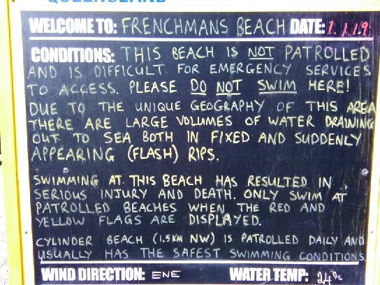 A sign displayed at Frenchman's beach on Stradbroke Island warning people not to swim.