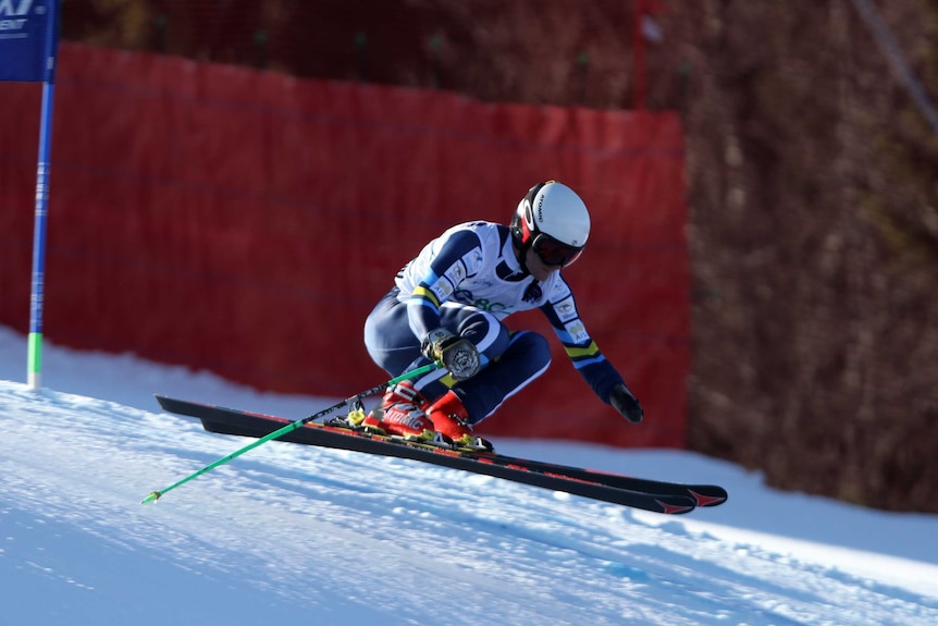 Para-athlete Mitch Gourley competing in para-skiing.
