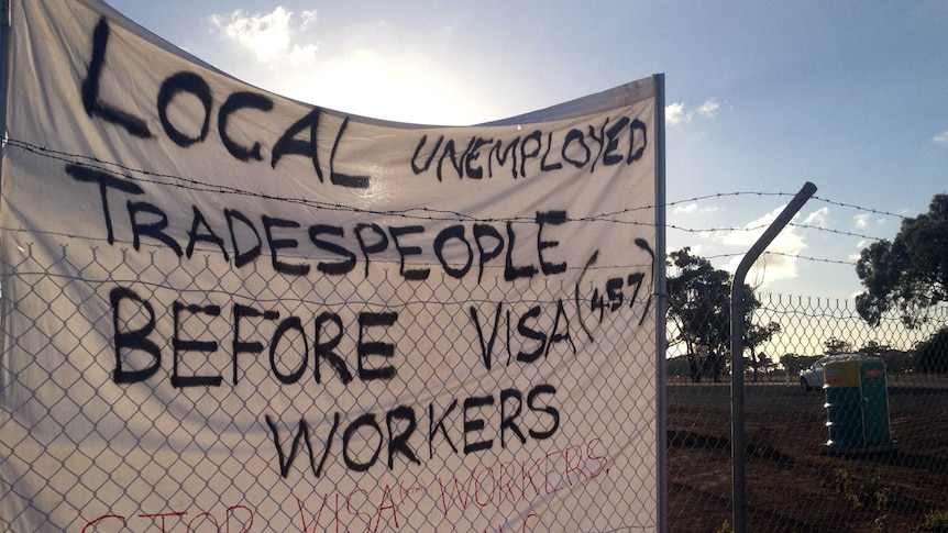 Workers blockade site over use of foreign labor