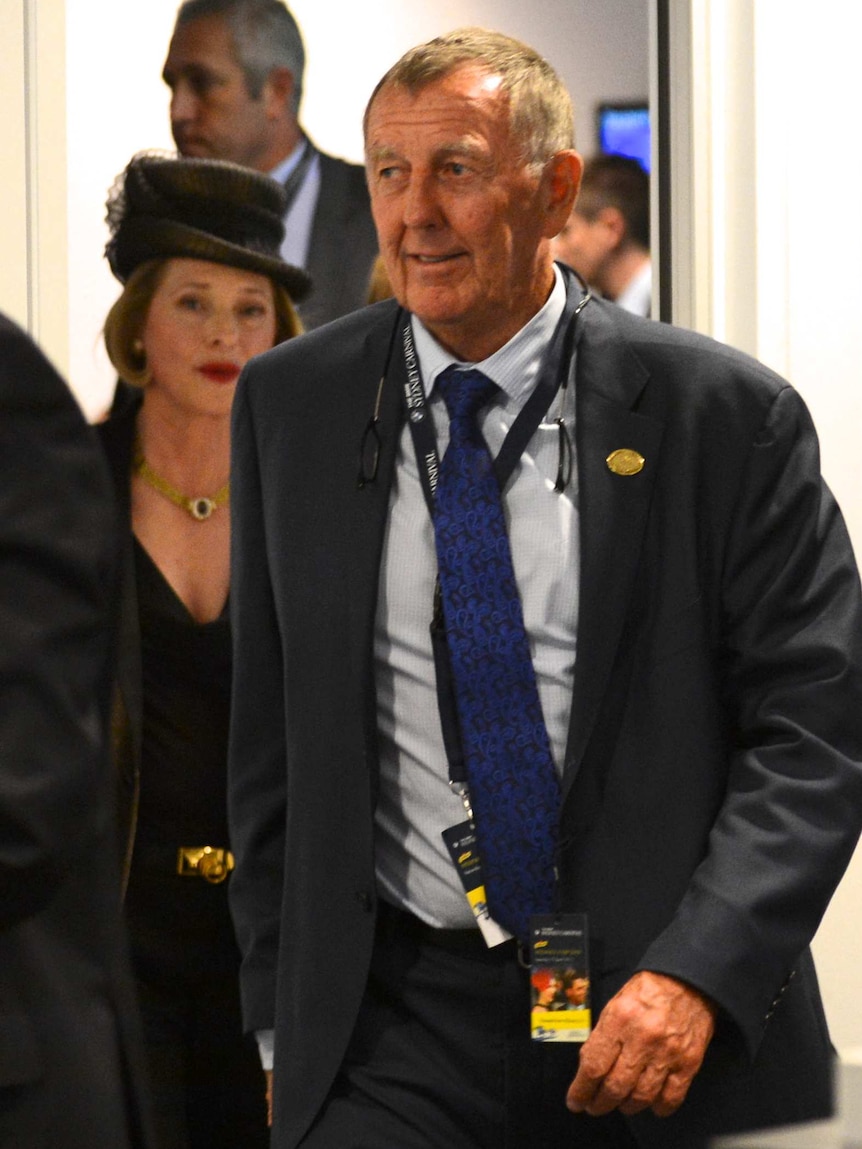 John Singleton leaves stewards inquiry with Gai Waterhouse (AAP: Dean Lewins)