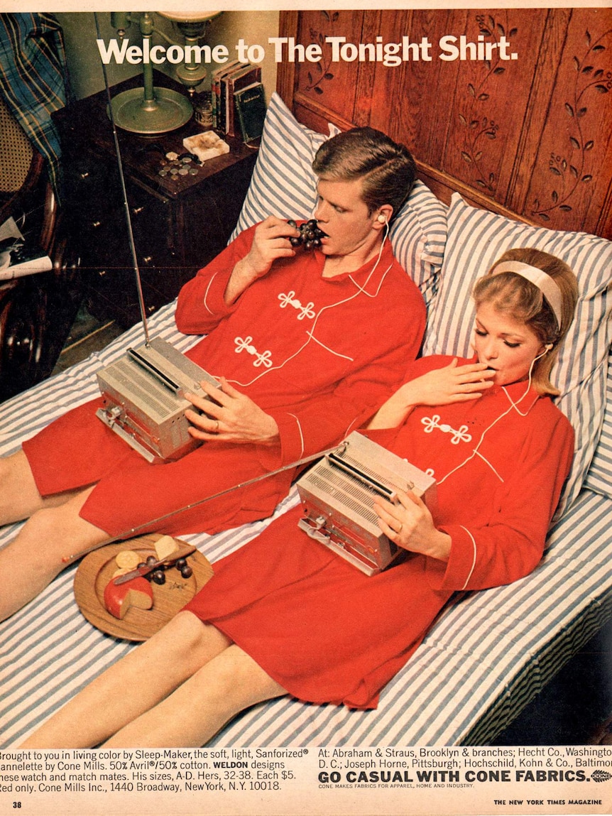 A 1960s advertisement showing a couple in bed watching individual mini TVs