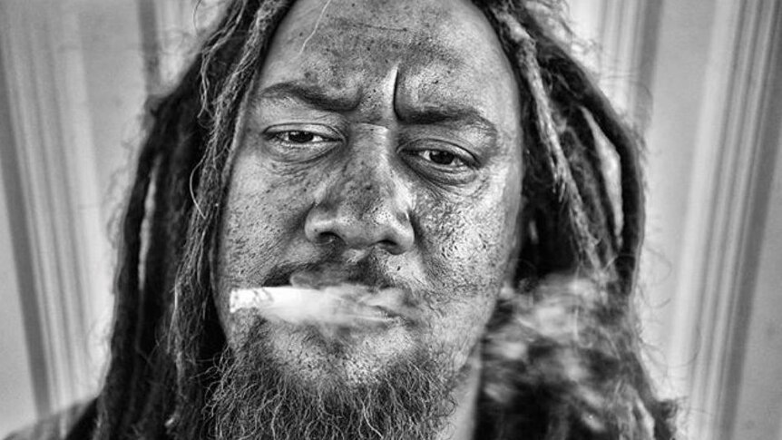 Black and white photo of man smoking