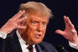 President Donald Trump gestures while speaking during the first presidential debate