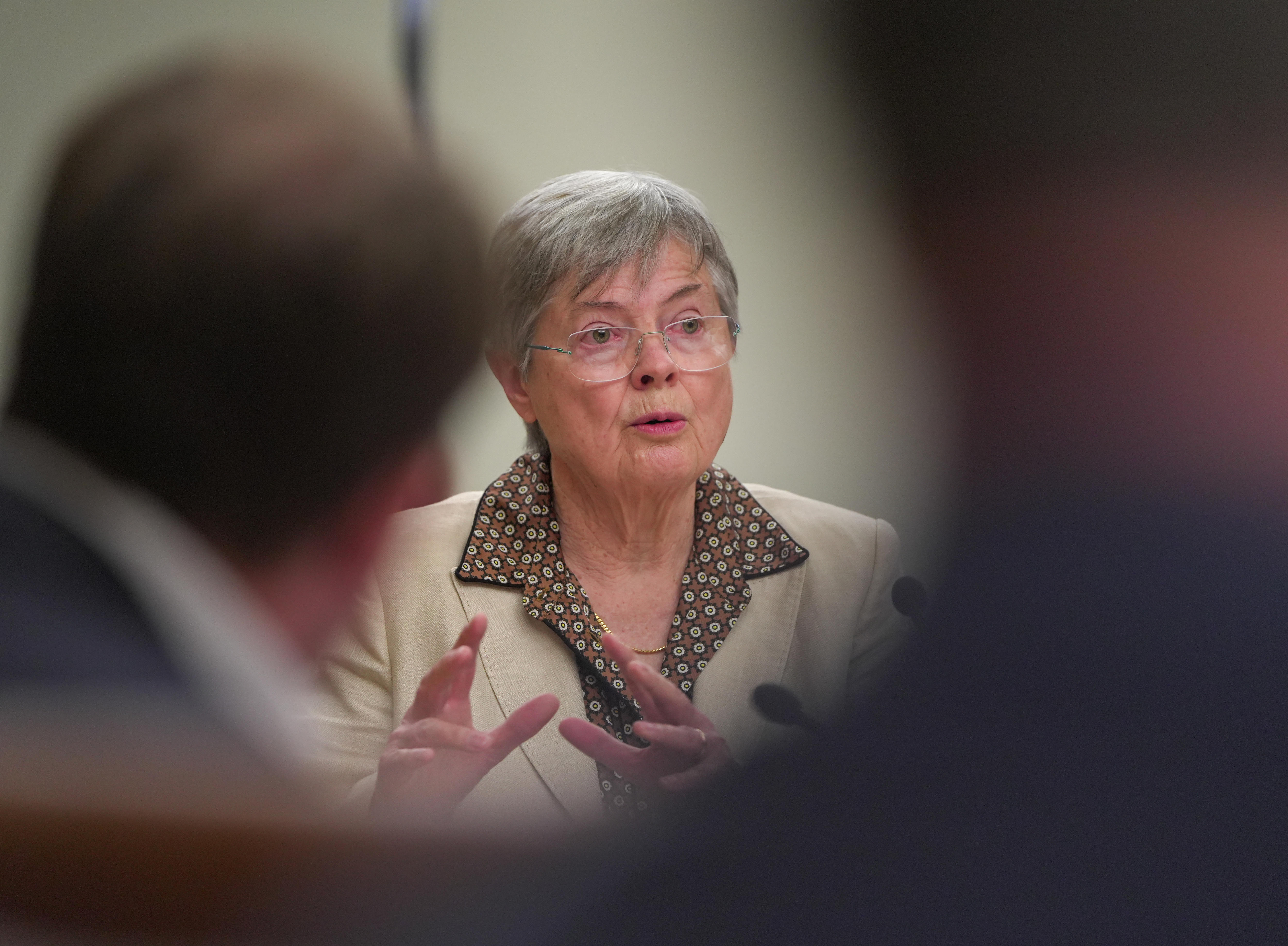 A woman at a parliamentary inquiry.