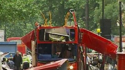 A bus destroyed by a blast.