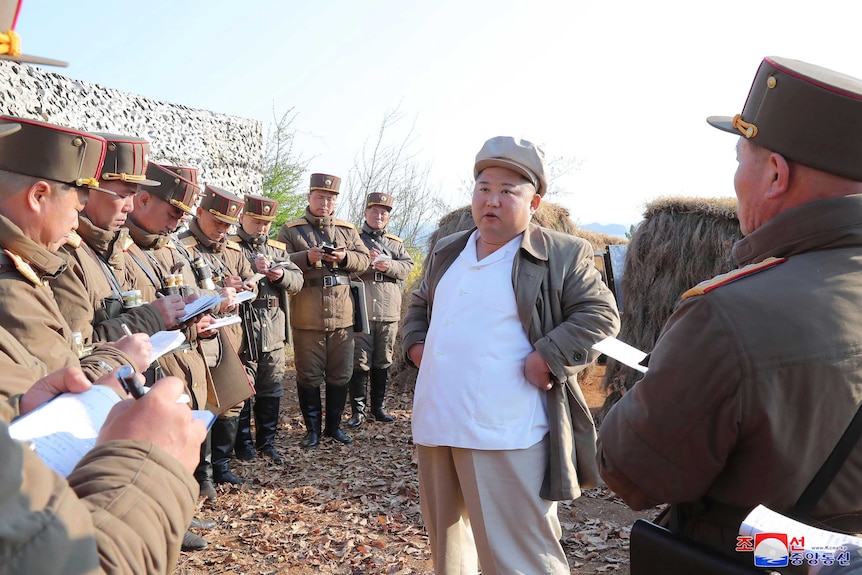 North Korean leader Kim Jong Un supervises a mortar firing drill in North Korea.