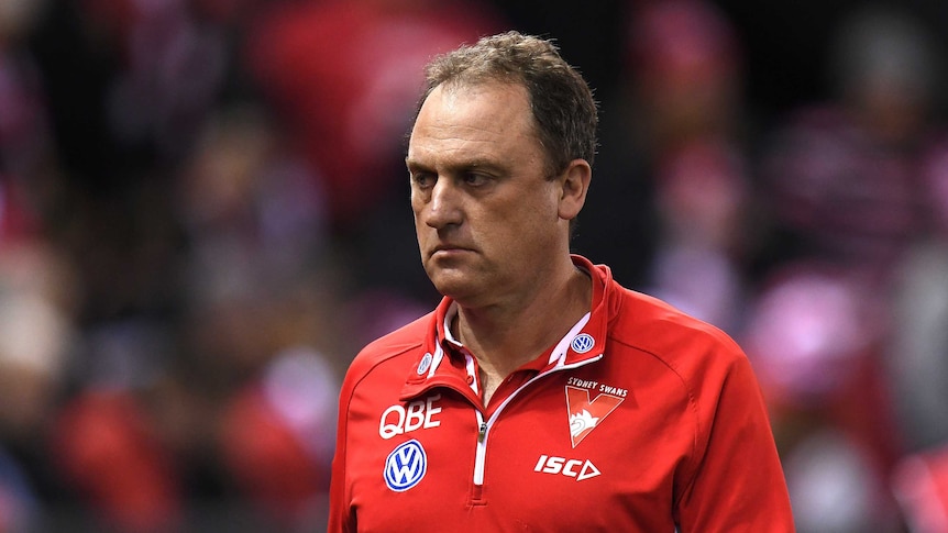 Sydney coach John Longmire looks unhappy.