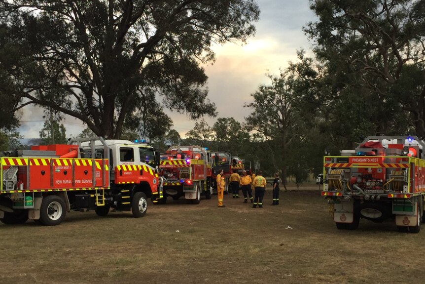 Fire trucks arrive in Mulgoa Park as firefighters tackle blaze.