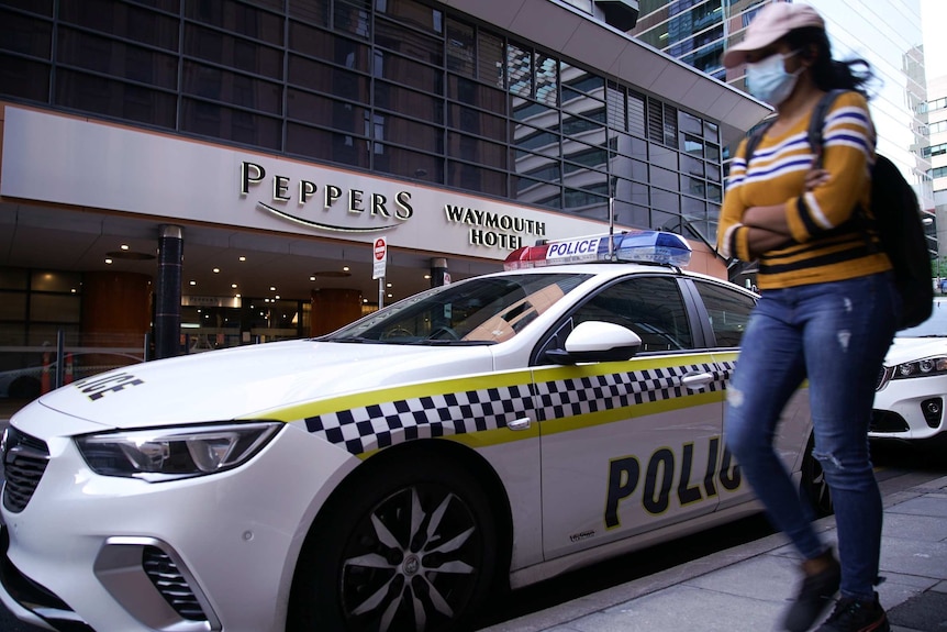 A police car is parked in front of the Peppers Waymouth Hotel in Adelaide's CBD.