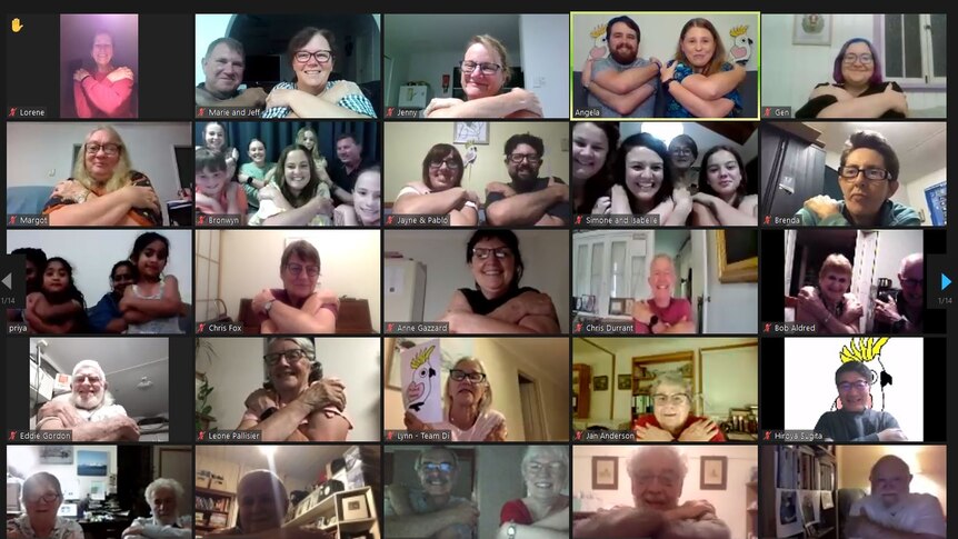 A series of video call boxes with people with their hands around each other