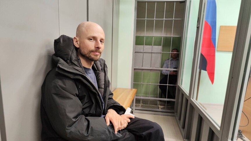 Sergey Karelin sita in a prison cell.