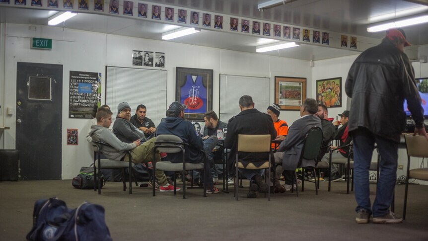 Players hang out in the club rooms after training