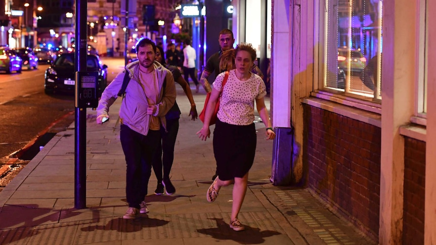 People run down Borough High Street as police are dealing with a "major incident" at London Bridge.