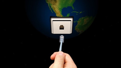 File photo: Hand Inserting a Plug into the Earth  (Getty Creative Images)