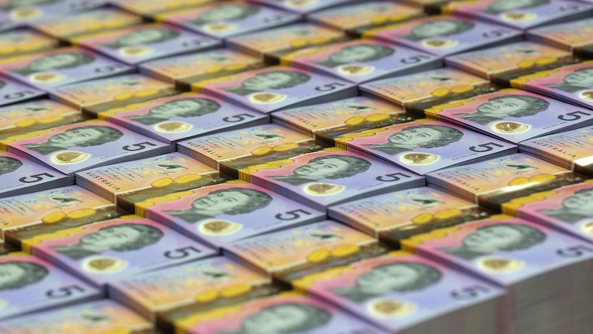 Stacks of $5 Australian bank notes.