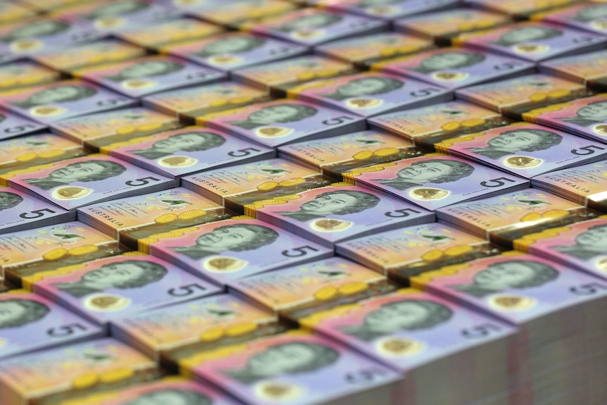 Stacks of $5 Australian bank notes.