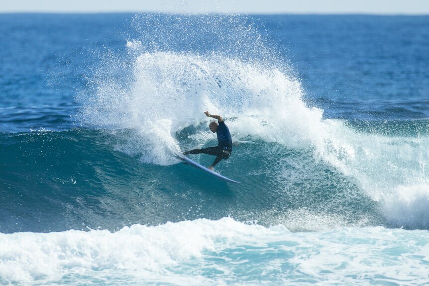 Kelly Slater surfing the waves at Margaret River.